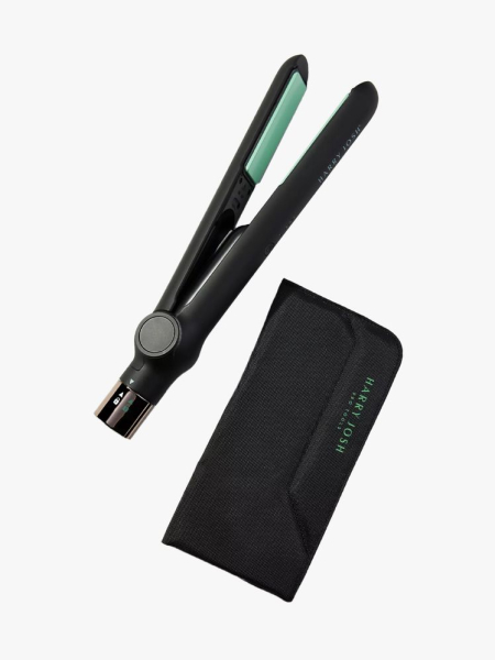 Harry Josh Cordless Styling Flat Iron in branded component on a light gray background
